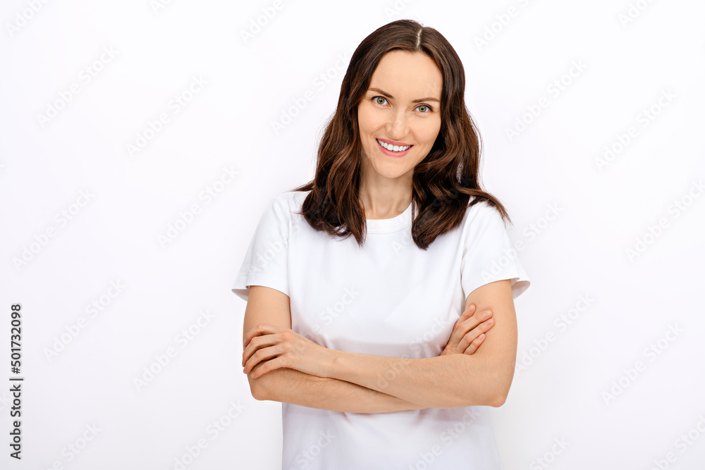 clean minimal portrait of smiling brunette woman in white T-shirt on white background for advertising, copy space, template clean minimal portrait of smiling brunette woman in white T-shirt on white background for advertising, copy space, template