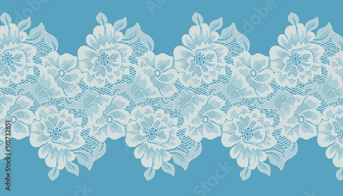 White flower Lace Pattern. Blue Backgrounds.