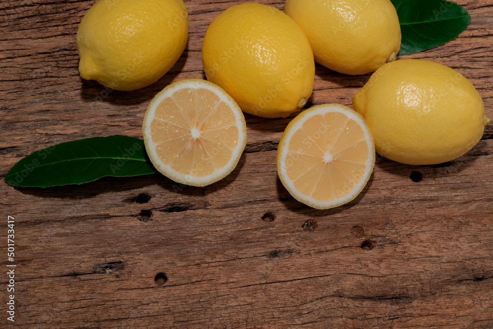 Pile lemon slice on wood background. Pile lemon slice on wood background.