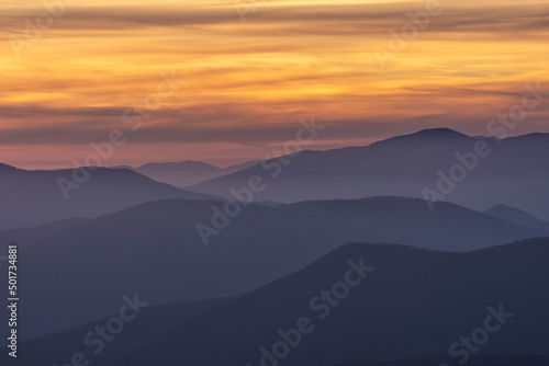 Beautiful colors of nature after sunset over foggy Old mountain, Bulgaria. Landscape, travel concept. Close up view.