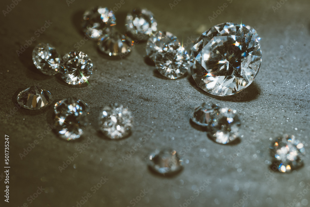 photo of round diamonds on the polishing and cutting surface photo of round diamonds on the polishing and cutting surface