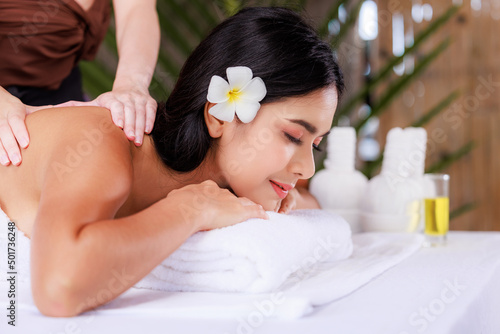 close up beautiful young asian woman lying relaxing in the spa salon massage