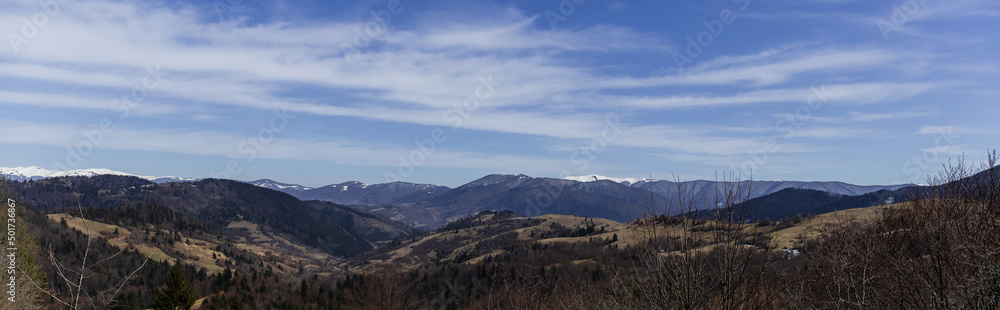 Scenic view of mountains and sky with clouds at daytime, banner.