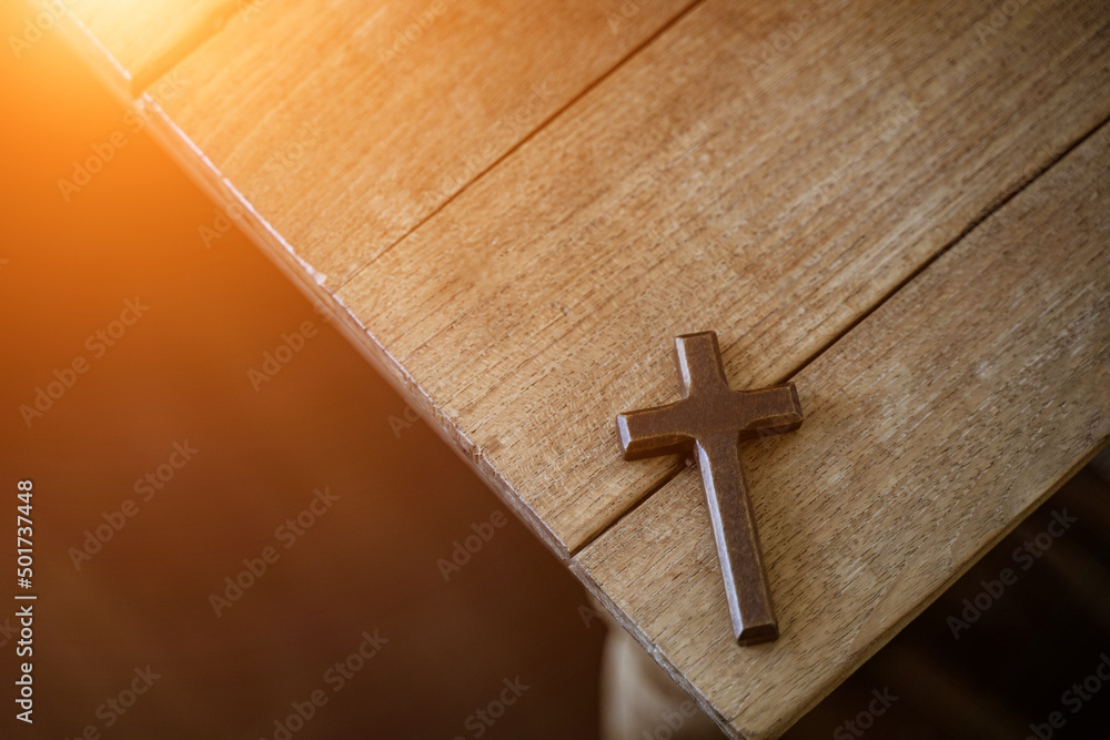 small cross and pray with religious belief and god belief on blessing background The power of hope or love and devotion.