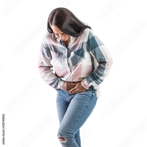 Menstrual or ovulatory pain, a woman in painful cramps holds her lower abdomen. Isolated on white photo