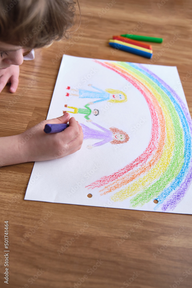 Crop child drawing on floor Crop child drawing on floor