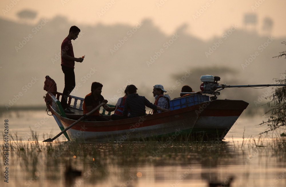 BHIGWAN, INDIA-DECEMBER 31: Toursits boating at Bhigwan bird sanctuary on December 31, 2021.