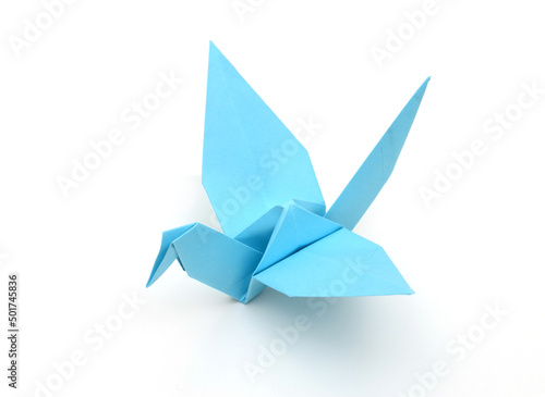 Origami bird (crane) isolated white