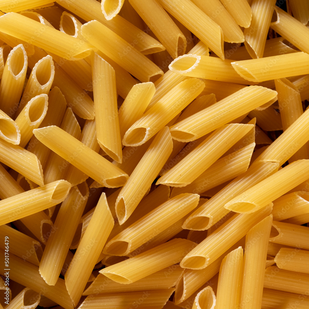 Close up of raw pasta, food backgrounds, organic ingredients Close up of raw pasta, food backgrounds, organic ingredients