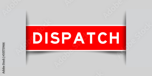 Inserted red color label sticker with word dispatched on gray background