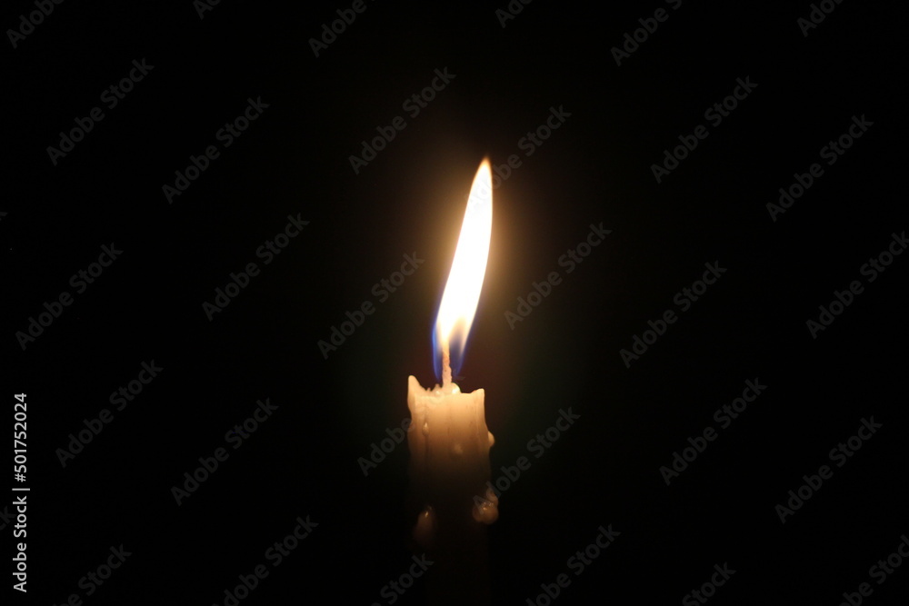 Candlelight burning in the darkness Candlelight burning in the darkness