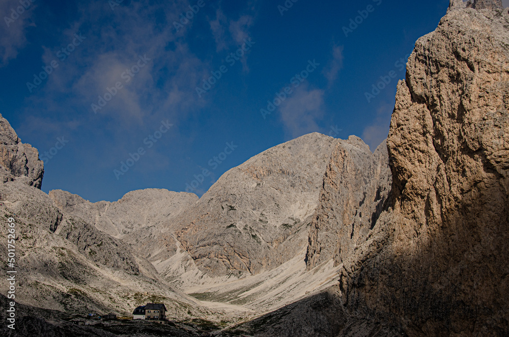Antermoia refuge, mountain hut located in Vallon d'Antermoia [valley], in a stony, moon-like valley in the eastern sector of Catinaccio group, Dolomites, South Tyrol, Italy  
