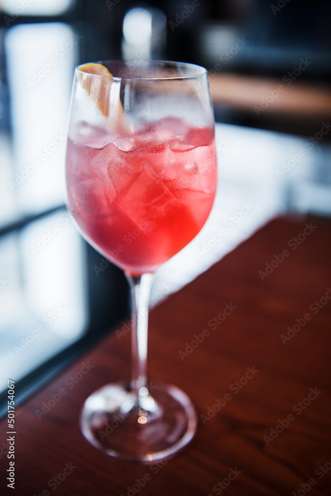 Vodka grapefruit cocktail garnished with lemon peel. Vodka grapefruit cocktail garnished with lemon peel.