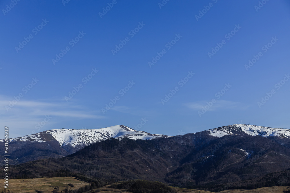 Mountains with snow and blue sky at daylight. Mountains with snow and blue sky at daylight.