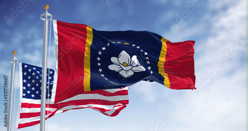 Cuadro en lienzo The Mississippi state flag waving along with the national flag of the United Sta