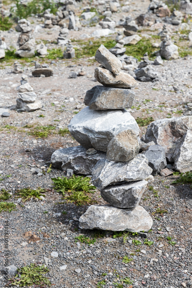 Stone cairns on the ground of former marble quarry Stone cairns on the ground of former marble quarry