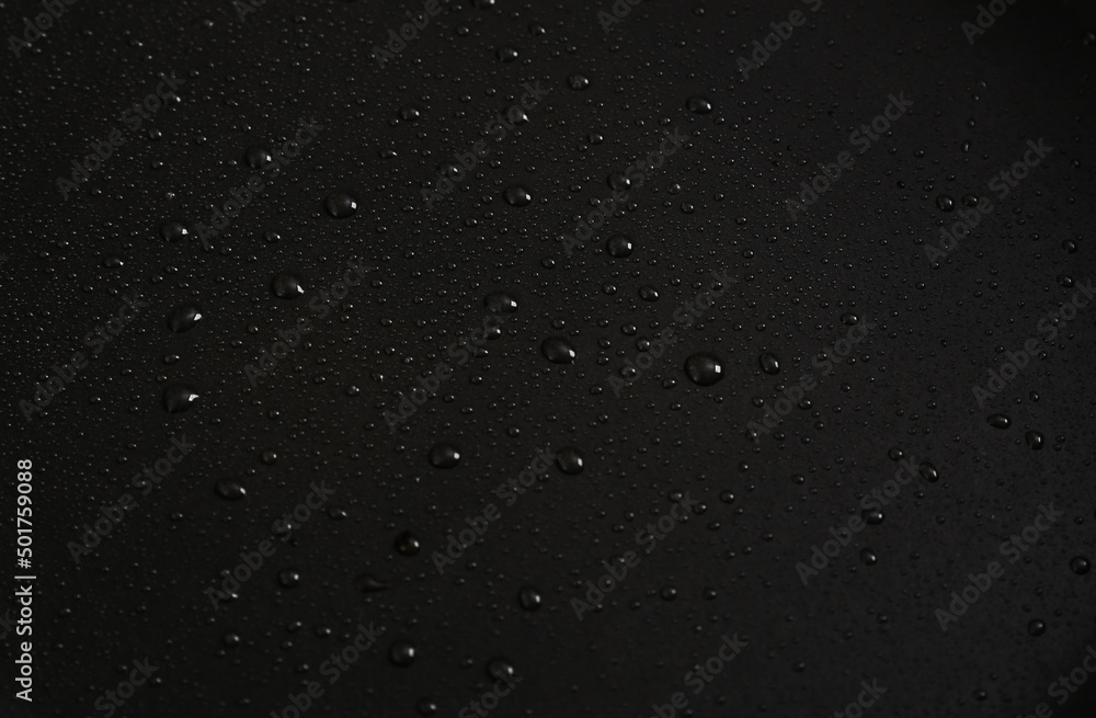 Black background with water drops. Dark background for design Black background with water drops. Dark background for design