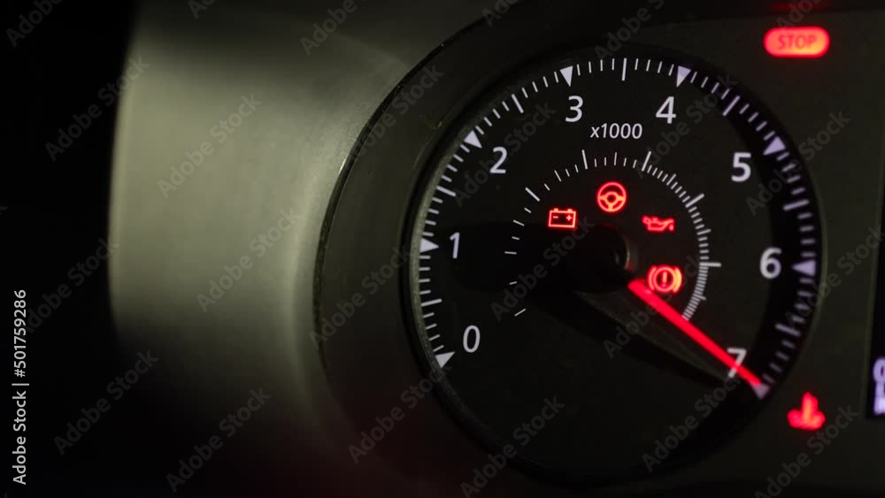 Dashboard in the car. Car tachometer when starter move.Check all sensores befor start for safety. Driver start engine. light leaks, speedometer and long exposure time, night driving abstract montage Dashboard in the car. Car tachometer when starter move.Check all sensores befor start for safety. Driver start engine. light leaks, speedometer and long exposure time, night driving abstract montage