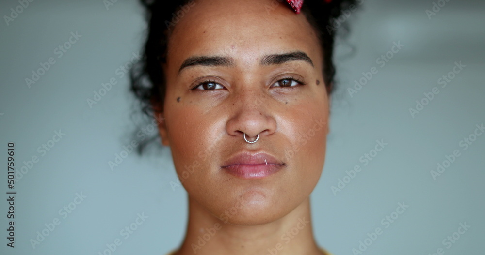 Young American from african descent mixed race girl with serious expression Young American from african descent mixed race girl with serious expression