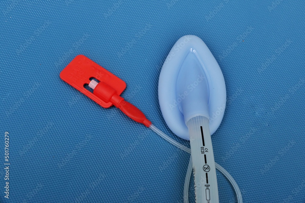 Inserting tip of a adult laryngeal mask airway (LMA). Image isolated on