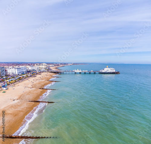 An aerial panorama view above the beach at Eastbourne, UK in springtime