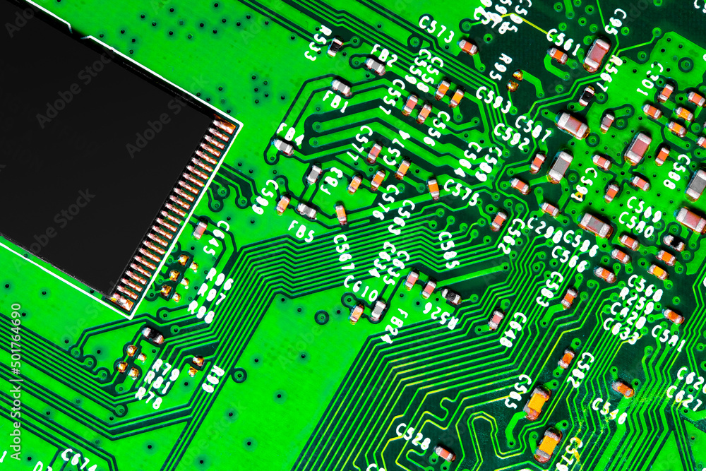 Close up of components and microchips on PC circuit board. Close up of components and microchips on PC circuit board.