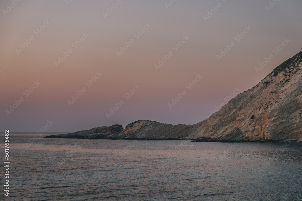 Limestone cliffs against pastel colors of blue hour, Kefalonia, Greece