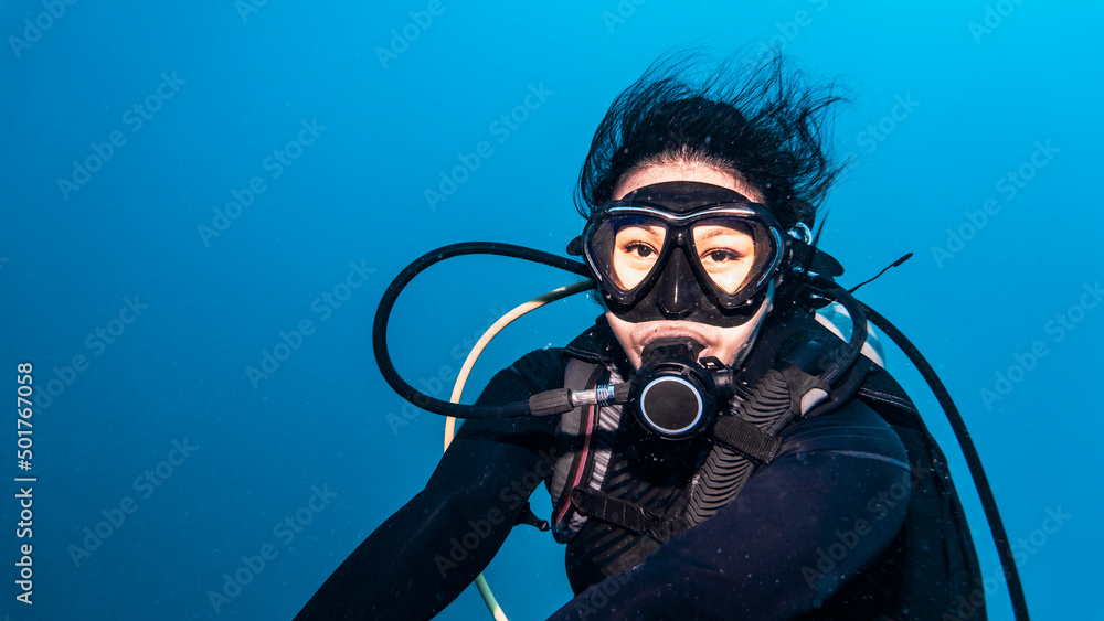 diver exploring the tropical waters around Koh Tao in Thailand diver exploring the tropical waters around Koh Tao in Thailand