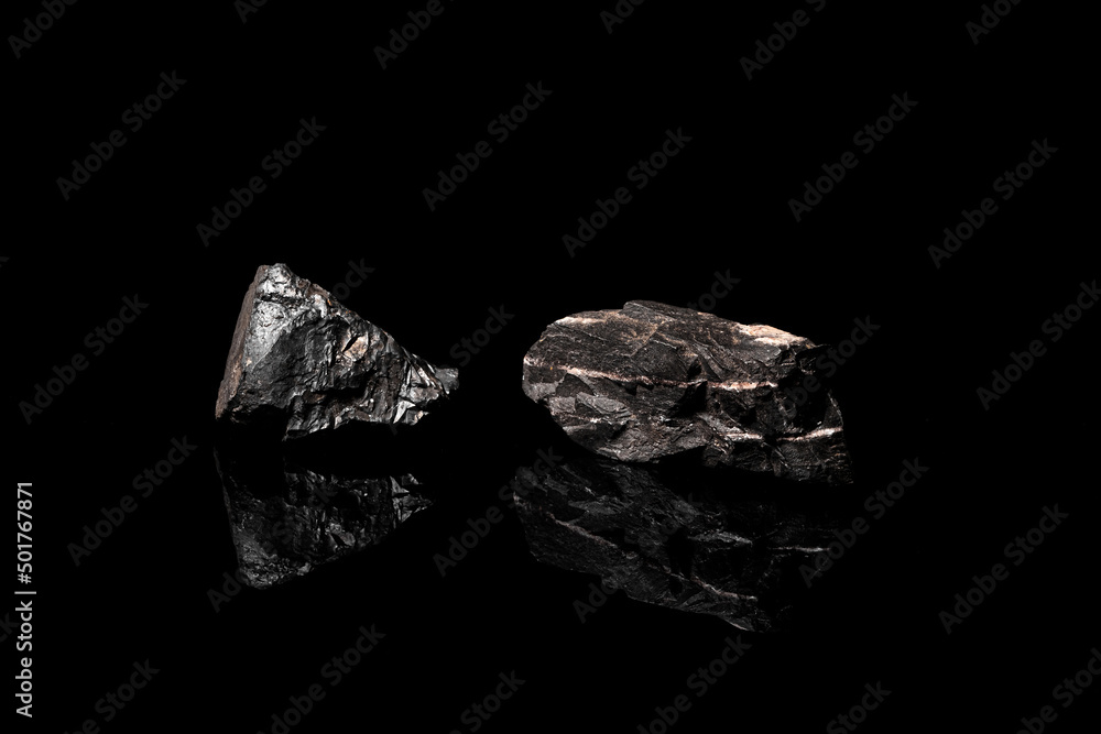 Macro Close up image of raw material Manganese Ore rock isolated Macro Close up image of raw material Manganese Ore rock isolated