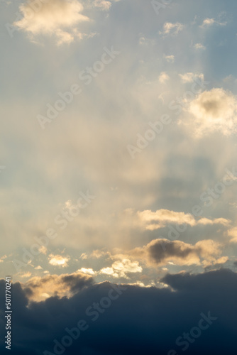 Fototapeta Naklejka Na Ścianę i Meble -  Dramatic sunset sky. The rays of the sun at sunset. Cloudy sky with sun rays.