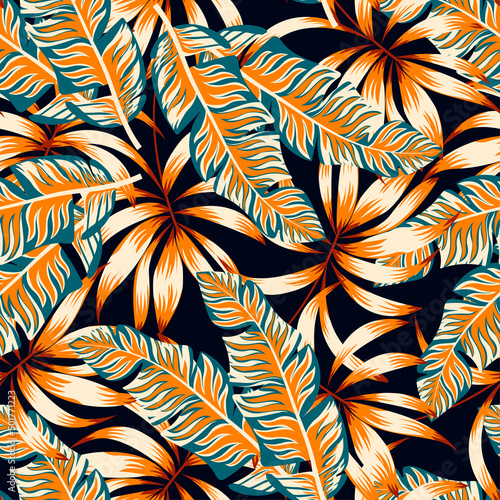 Original seamless tropical pattern with bright plants and leaves on a black background. Summer colorful hawaiian. Colorful stylish floral. Tropic leaves in bright colors. Hawaiian style.