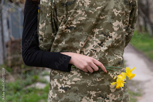 Soldier with his girlfriend. War in Ukraine. Glory to Ukraine - glory to the heroes
