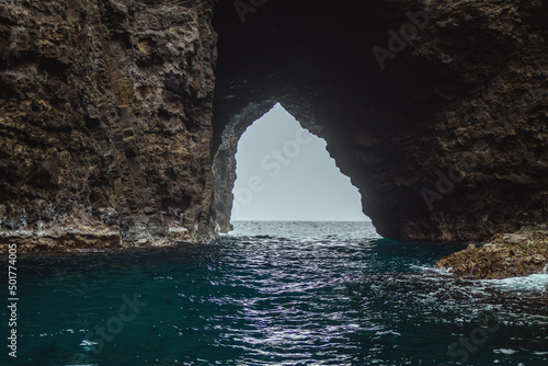 Deep sea caves and rocky formations on the Napali coast of the Hawaiian island of Kauai