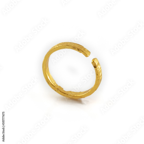 Irregular adjustable rotating golden ring isolated on white background