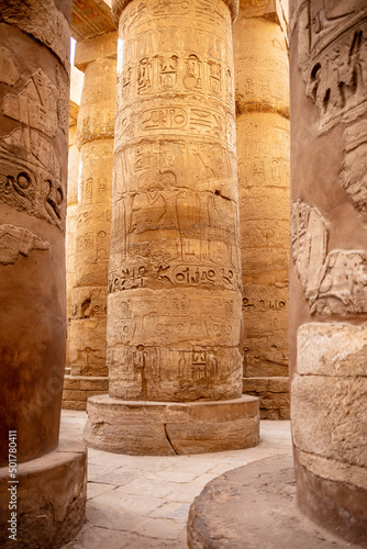Different columns with hieroglyphs in Karnak temple. Karnak temple is the largest complex in ancient Egypt.