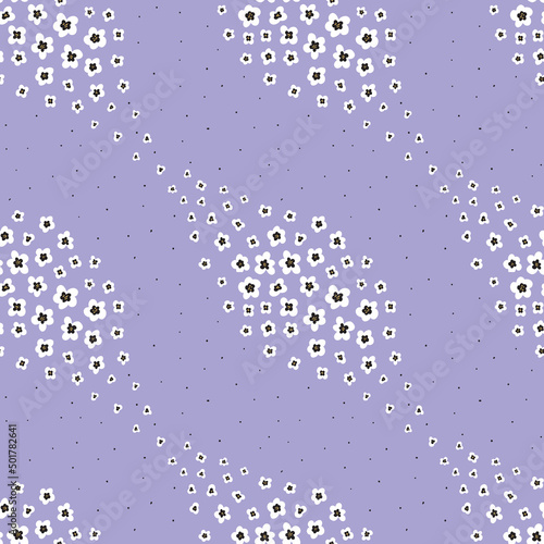 Vector seamless pattern background with ditsy hand drawn flowers on ery peri purple background