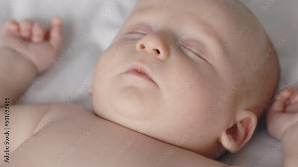 Newborn baby boy having sweet dreams at home Newborn baby boy having sweet dreams at home