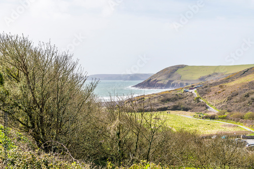 A view down the valley towards the beach at Manorbier on the Pembrokeshire coast, South Wales in springtime