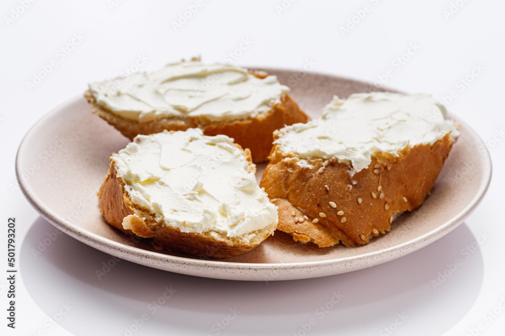 baguette cream cheese sandwich on a white background baguette cream cheese sandwich on a white background