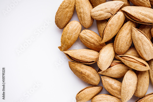 fresh almonds in shell on a white background