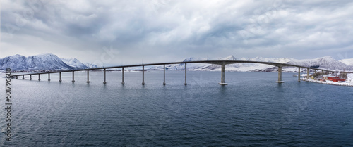 Andøy Bridge crossing the dredged Risøysundet strait between the islands of Andøya and Hinnøya, Nordland, Norway. photo