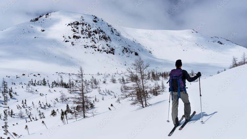 Man springtime backcountry skiing in the Chics-Chocs Mountains, Quebec, Canada.