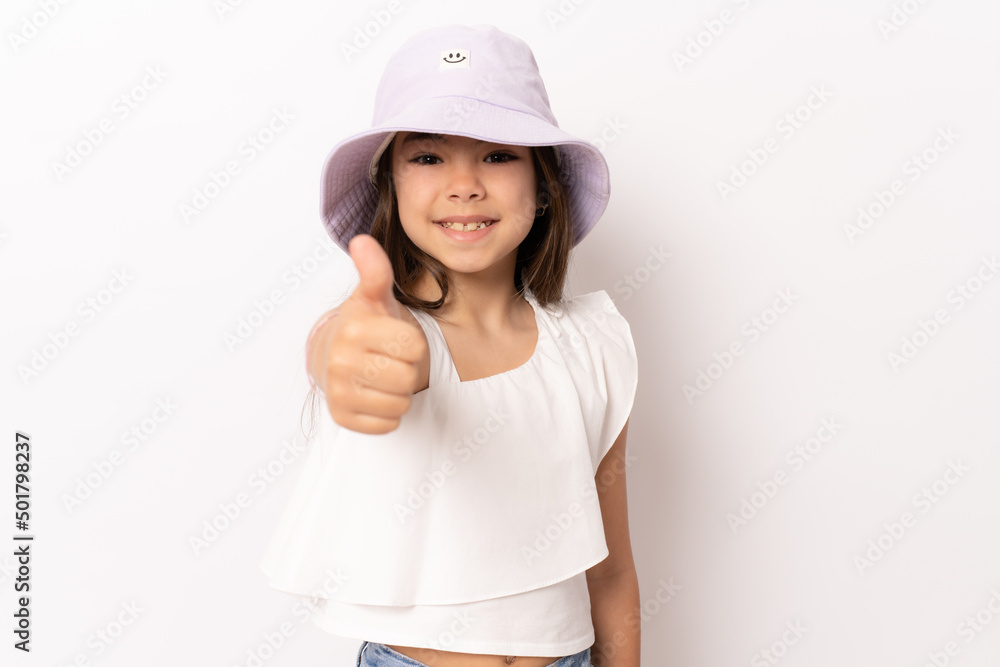 Close up portrait Photo portrait girl smiling cheerful wearing cap in summer with thumb up isolated over white background Close up portrait Photo portrait girl smiling cheerful wearing cap in summer with thumb up isolated over white background