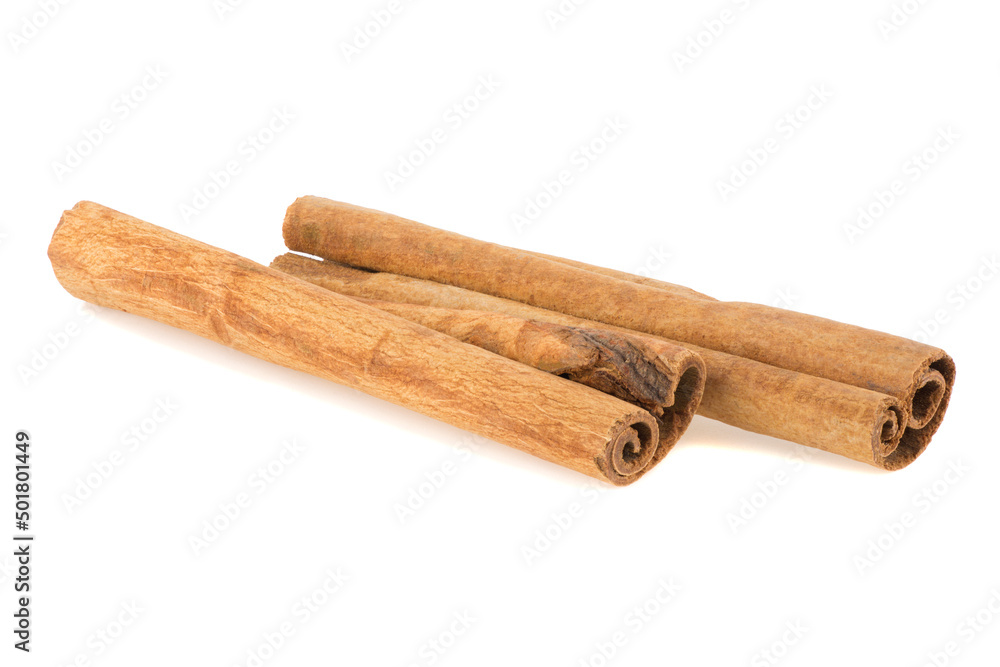 two cinnamon sticks isolated on white background