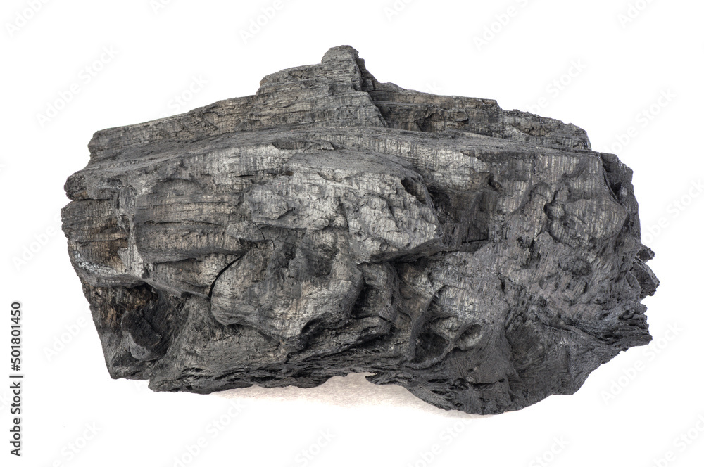 Natural wood charcoal isolated on a white background. Hard wood charcoal. Natural wood charcoal isolated on a white background. Hard wood charcoal.