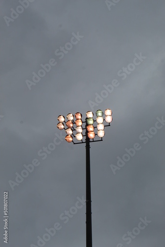 stadium lights on a sky photo