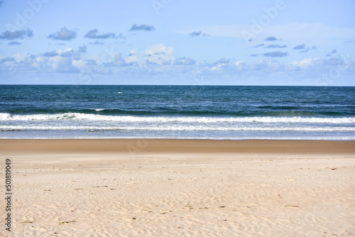 beach and sea in the morning  sea       with calm waves  sea with small waves  horizon line