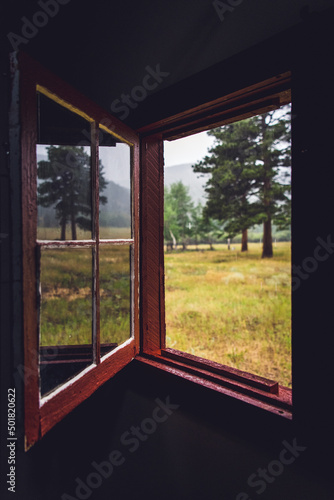 A Window Opens to Look Out on a Rainy Day in the Colorado Mountains