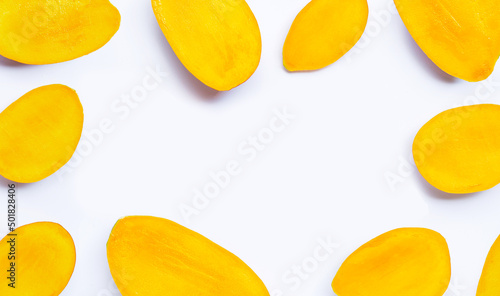 Tropical fruit, Frame made of mango slices on white background.