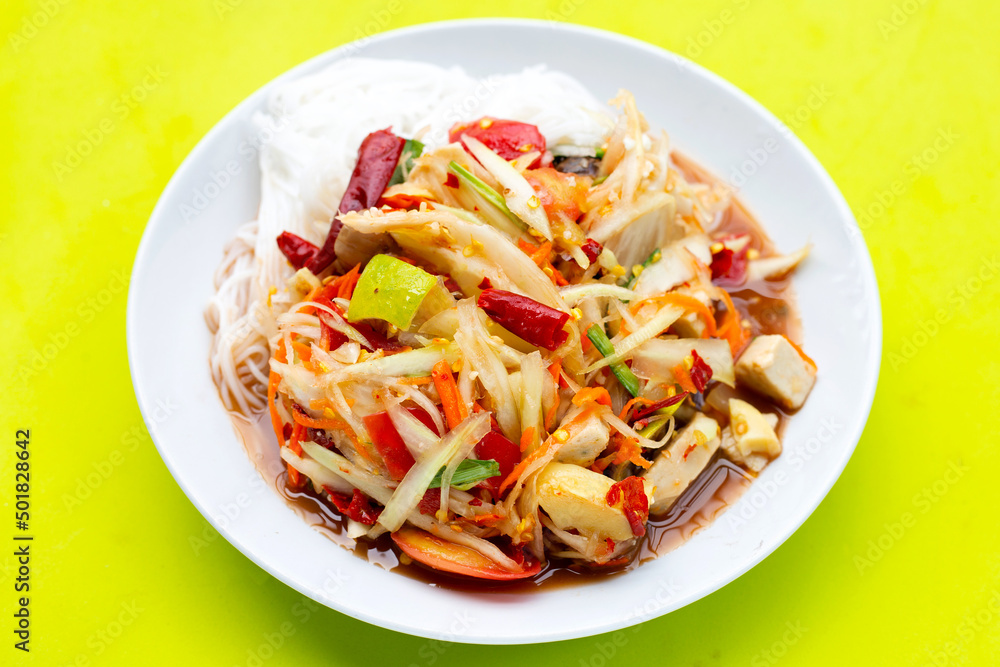 Spicy green papaya salad with vermicelli. Spicy green papaya salad with vermicelli.